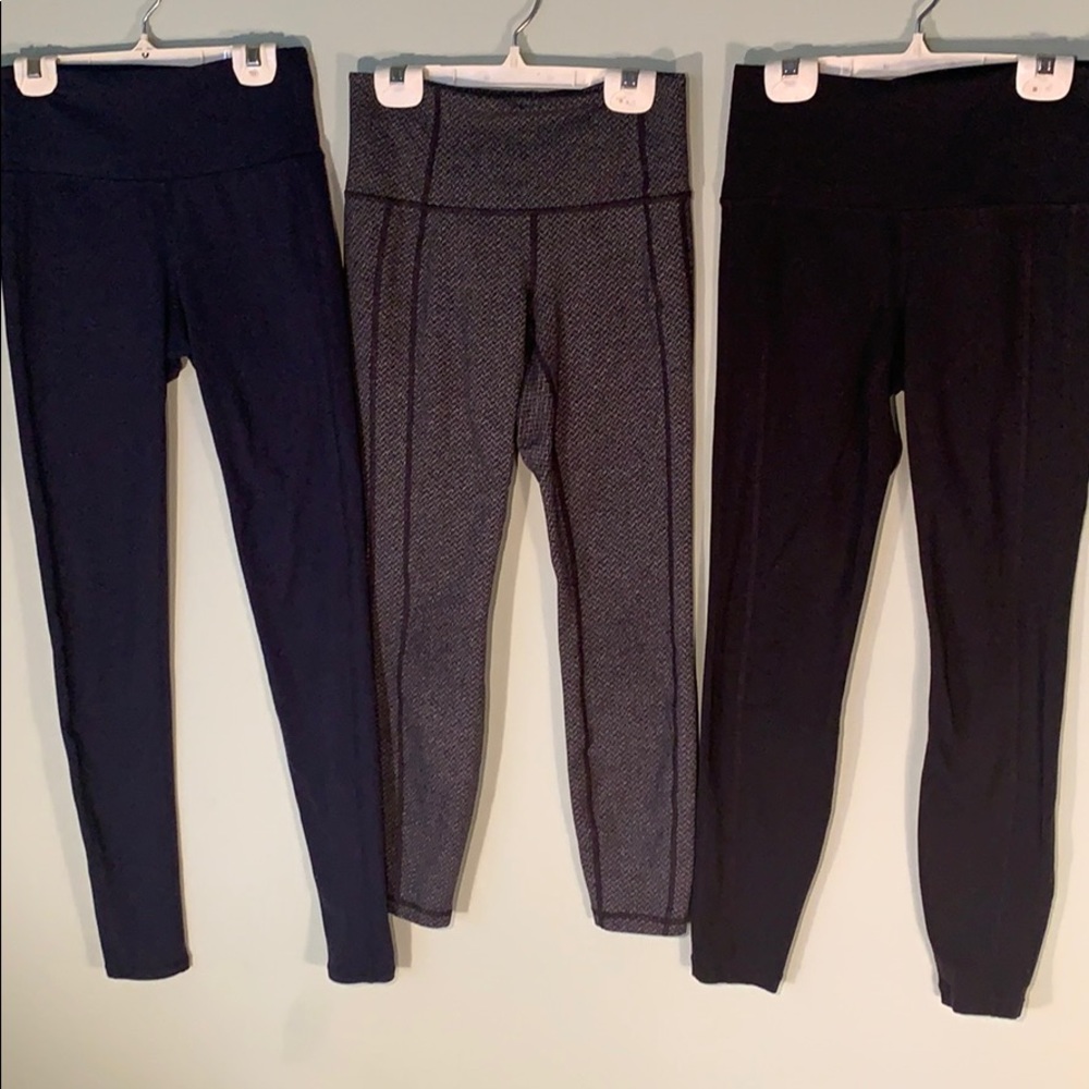 One set of 3 pairs of Athleta leggings! XS